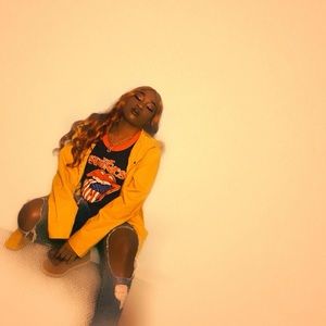 “DONT EVEN TRY IT” mustard yellow jacket.